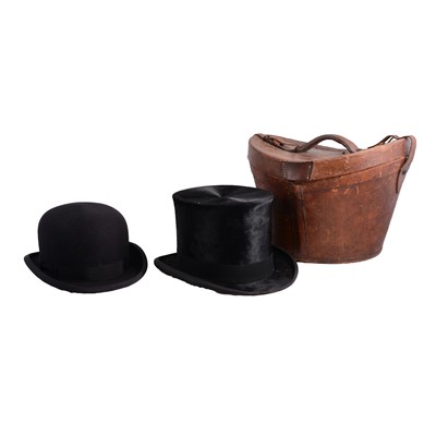 Lot 142 - Vintage top hat, in a leather case and a bowler hat