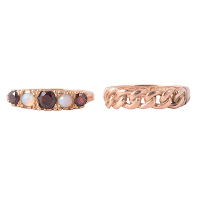Lot 54 - A garnet and opal half hoop ring, and a Victorian 9 carat yellow gold curb link ring.