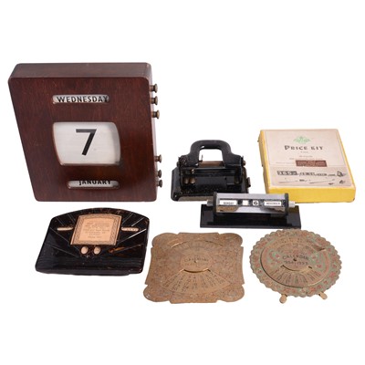 Lot 103 - Quantity of vintage desktop calendars, bakelite telephone, and similar