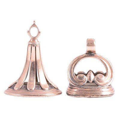 Lot 359 - Two antique yellow metal seals with intaglio carved bases.