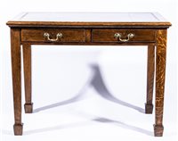 Lot 412 - Edwardian oak writing table, rectangular top...
