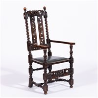 Lot 413 - Restoration style oak elbow chair, 20th...