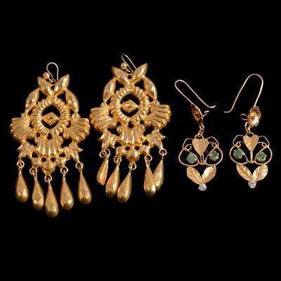 Lot 187 - Two pairs of ornate yellow metal drop earrings.
