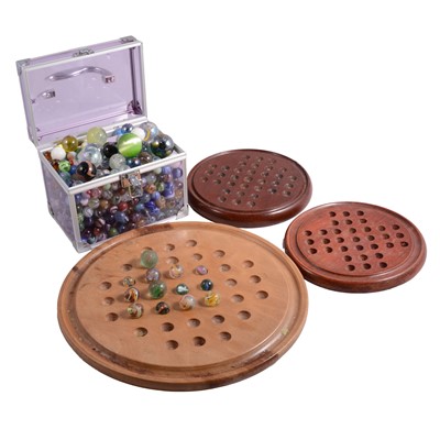 Lot 199 - Collection of 19th century and later handblown glass marbles, and three solitaire boards