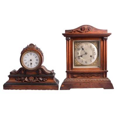 Lot 84 - Two walnut cased mantel clocks