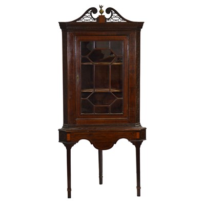 Lot 513 - George IV mahogany corner cabinet on stand