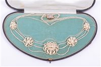 Lot 200 - A Victorian seed pearl necklace, four floral...