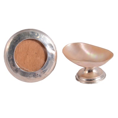 Lot 384 - Silver-mounted photograph frame, and silver and mother-of-pearl salt bowl.