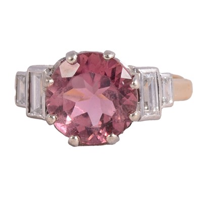 Lot 33 - A pink tourmaline and diamond ring.