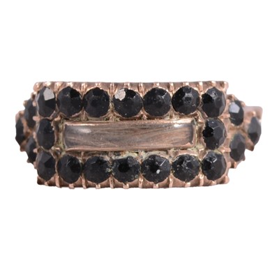 Lot 80 - An In Memoriam ring.