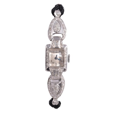 Lot 340 - A lady's vintage diamond set manual wind cocktail wristwatch.