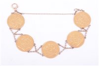 Lot 215 - A gold sovereign bracelet, five full...