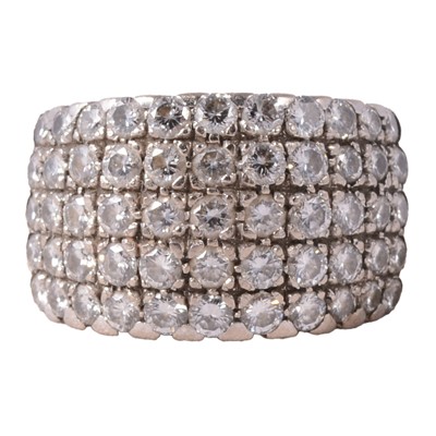 Lot 96 - A diamond five row multi stone wide hoop ring.