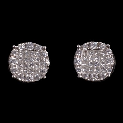 Lot 177 - A pair of diamond cluster earrings.