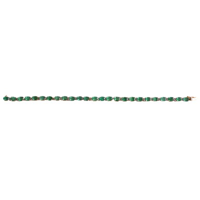 Lot 283 - An emerald and diamond bracelet.