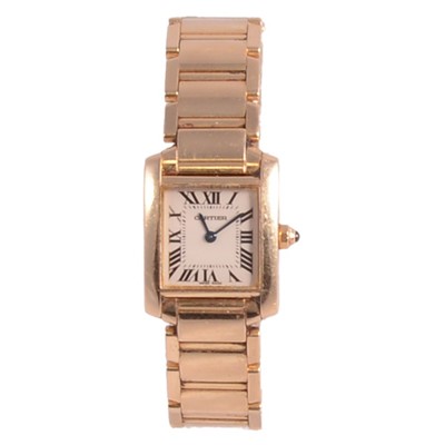 Lot 1084 - Cartier - a lady's 18 carat yellow gold Tank Française quartz bracelet wristwatch.