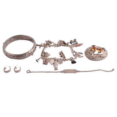 Lot 1250 - Silver half-hinged bangle, charm bracelet, identity bracelet, Scottish brooch, and earrings.
