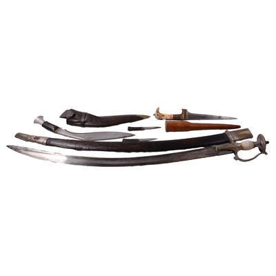 Lot 152 - Persian cavalry sword, a Kukri knife, and another Oriental bladed weapon