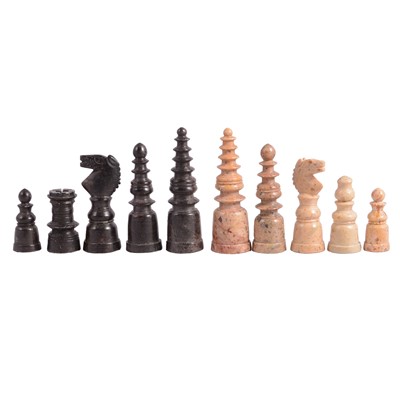 Lot 136 - Decorative carved stone chess set