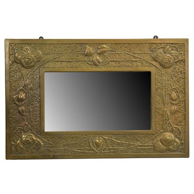 Lot 244 - Arts and Crafts brass-framed wall mirror, Glasgow style
