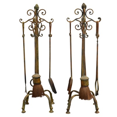 Lot 567 - Two sets of fireside accessories on stands
