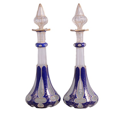 Lot 28 - Pair of 19th century overlaid glass decanters