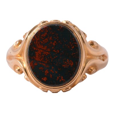Lot 148 - A Victorian 18 carat yellow gold bloodstone signet ring.