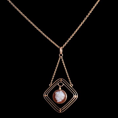 Lot 230 - A bar brooch with three small pearls, and small hardstone cameo pendant on a chain