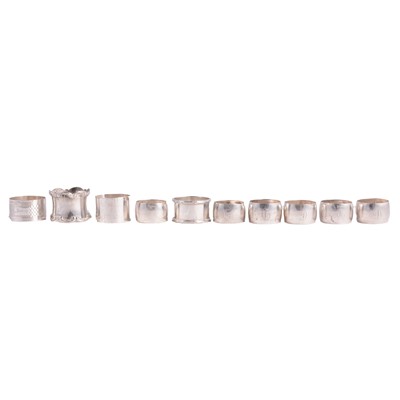 Lot 346 - Set of six white metal napkin rings, and four silver napkin rings.