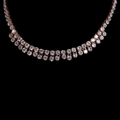 Lot 354 - A synthetic white sapphire necklace, and matching pair of earclips.