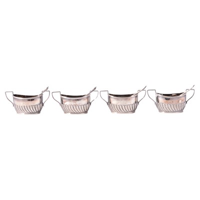 Lot 337 - Set of four silver salts with spoons