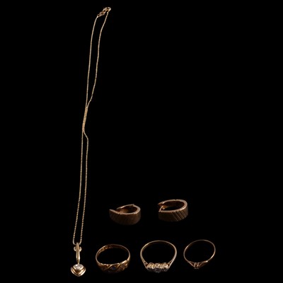 Lot 1136 - A pair of yellow metal earrings, three rings, necklace.
