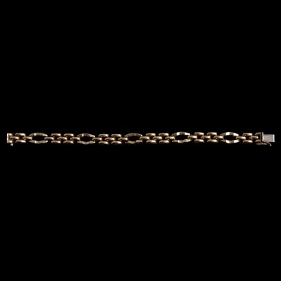 Lot 310 - A 9 carat yellow gold bracelet.