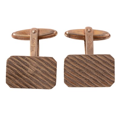 Lot 464 - A pair of 9 carat yellow gold cufflinks.