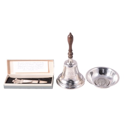 Lot 348 - Commemorative silver table bell, money clip, dish
