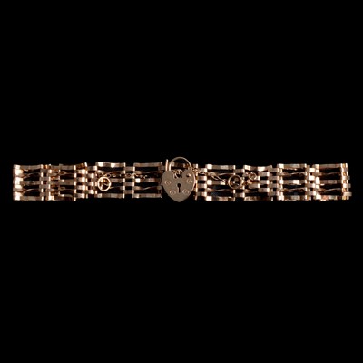 Lot 306 - A 9 carat yellow gold gate link bracelet.