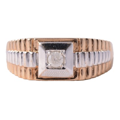 Lot 144 - A Rolex style ring set with a diamond.