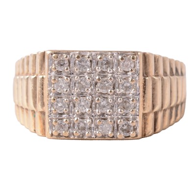 Lot 145 - A Rolex style ring set with sixteen diamonds.