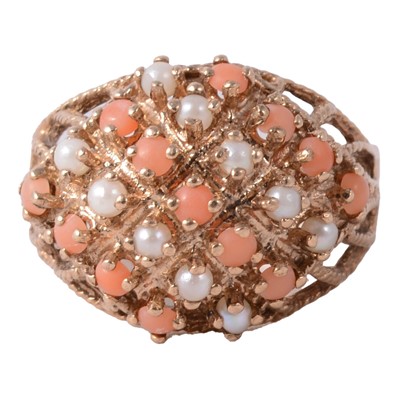 Lot 121 - A coral and pearl ring.