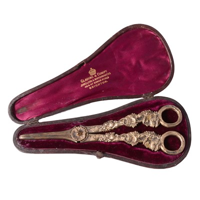 Lot 134 - A pair of Victorian silver-gilt grape scissors, George Adams, London 1853