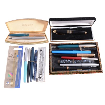Lot 132 - A shallow lacquered box with small collection of pens