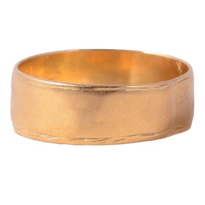 Lot 172 - A yellow metal wedding band.
