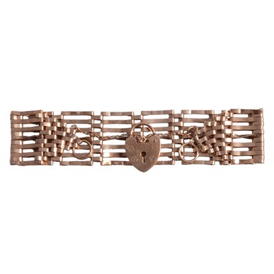 Lot 302 - A 9 carat yellow gold gate link bracelet.