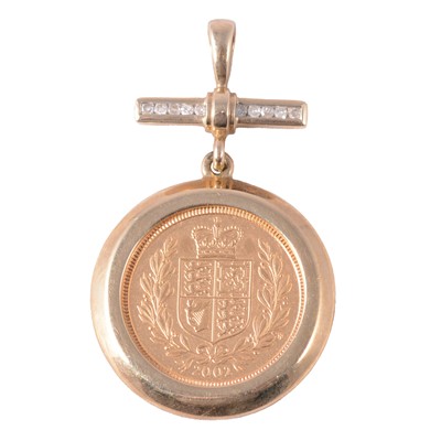 Lot 207 - A Gold Half Sovereign Coin pendant set with diamonds.