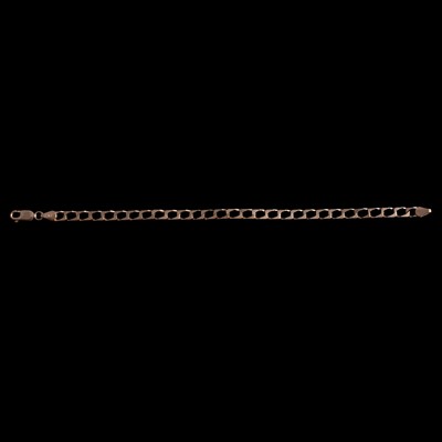Lot 297 - A 9 carat yellow gold bracelet.