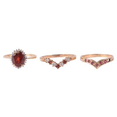 Lot 30 - Three 9 carat yellow gold gemset dress rings.
