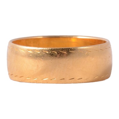 Lot 165 - A 22 carat gold wedding band.