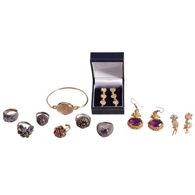 Lot 1248 - Gemset white metal rings, costume jewellery ring, earrings, and lady's quartz bangle wristwatch.