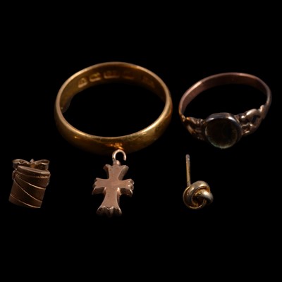 Lot 1123 - A 22 carat gold wedding band, small ring, cross and earrings.