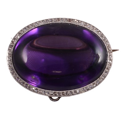 Lot 248 - An amethyst and diamond brooch.